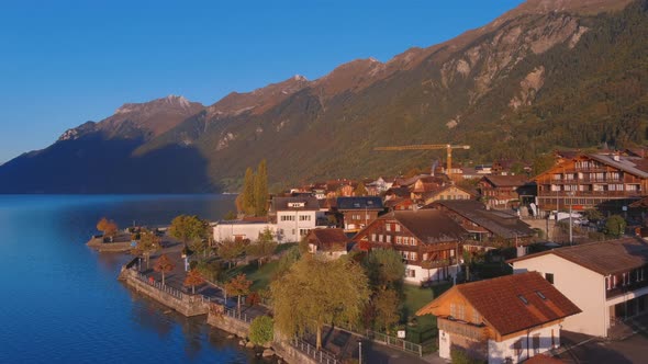 Sunrise drone view of shoreline in scenic village of Brienz Switzerland, Europe, wide angle