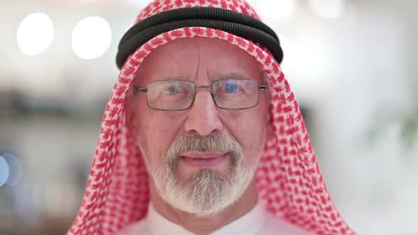 Close Up of Senior Old Arab Man Smiling at the Camera