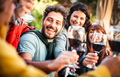 Happy people on genuine mood drinking red wine at pic nic garden party - PhotoDune Item for Sale