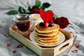 Homemade pancakes with berries, cup of tea and flowers and gift box. Breakfast for Valentine's Day. - PhotoDune Item for Sale