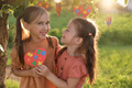 Two cute funny happy loving girls supporting each other on autism Awareness Day - PhotoDune Item for Sale