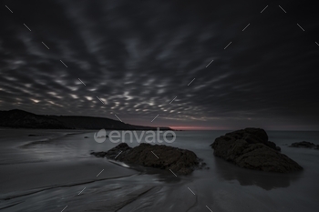  dark cloudy sky with long exposure in the evening in Cornwall, UK