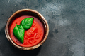 Tomato soup with basil over dark backdrop, top view, copy space - PhotoDune Item for Sale