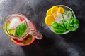 Strawberry basil lemonade iced jug pitcher over dark backdrop, top view - PhotoDune Item for Sale