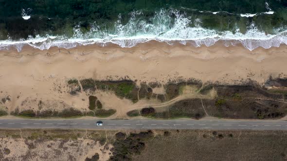 Aerial view to a road near to the sea