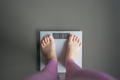 Woman watching her weight . Weight loss. Healthy weight. - PhotoDune Item for Sale