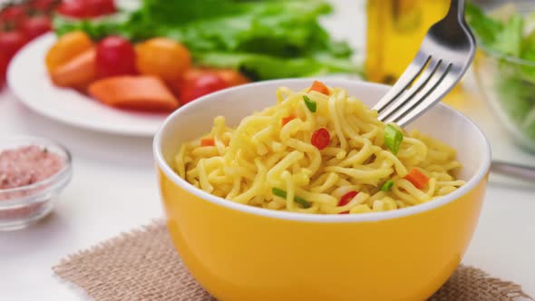 Instant Noodles with Fork Served with Vegetables and Herbs ProRes Uncompressed