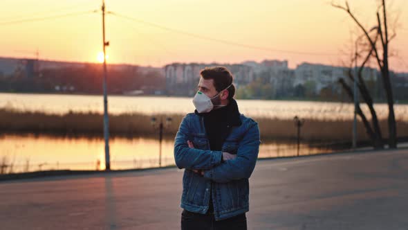 Man with a Protective Mask Standing in Front of