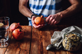 Man Opens Pomegranate with a Knife. - PhotoDune Item for Sale