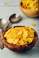 Rustic bowls of cornflakes with spoons - PhotoDune Item for Sale