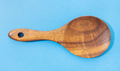 Wooden spoon isolated on blue background - PhotoDune Item for Sale