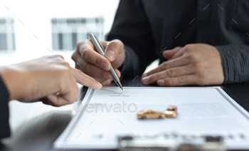 cuments and car sales agreements with insurance. Document signing and credit approval Concept.