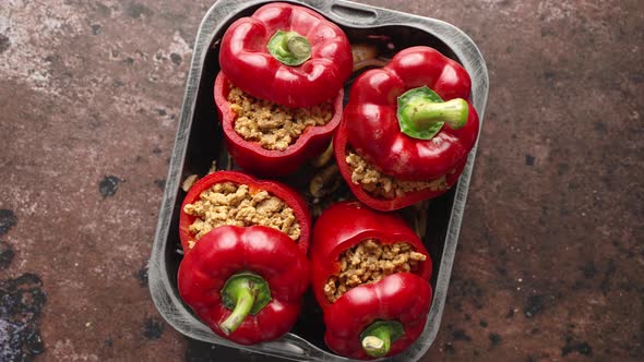 Sweet Red Peppers Stuffed with Meat and Tomato in a Vintage Frying Tray