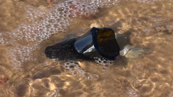 Broken Glass On The Beach