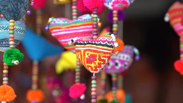 Colorful handmade souvenirs for sale in street market in village Sapa, Vietnam