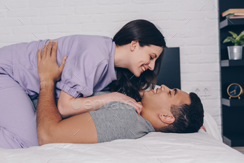 acial man in bedroom