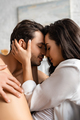 Boyfriend and girlfriend with closed eyes hugging and smiling - PhotoDune Item for Sale