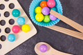Colorful balls with spoon and tongs. Development of kids motor skills - PhotoDune Item for Sale