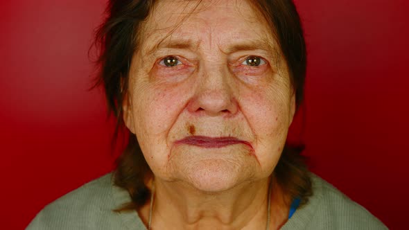 Mature Woman on Red Background