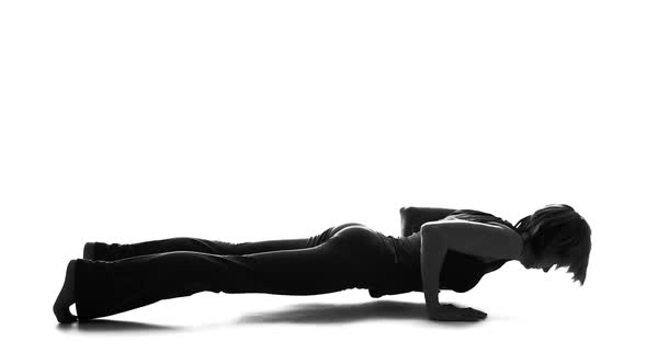 Fitness Woman Silhouette Practicing Yoga, Plank Exercise, Home Workout, Health