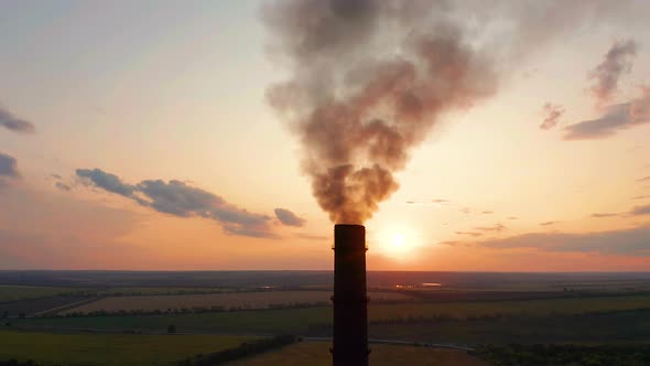 Aerial View. Pipes Throwing Smoke in the Sky. Air Pollution From Industrial Plants