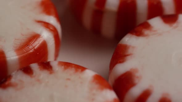 Rotating shot of peppermint candies - CANDY PEPPERMINT 032