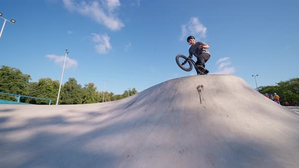 Man Jump On Mountain On Bmx