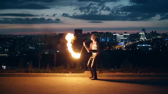 Young Blond Male Getting Ready To Perform Fire Show, Male Disappointed