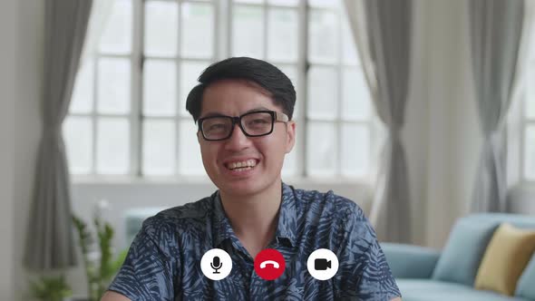 Asian Man Make A Video Call From Home