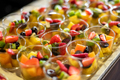 Many fruit salad bowls placed on tray - PhotoDune Item for Sale