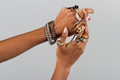 Jewelry on black hands closeup - PhotoDune Item for Sale