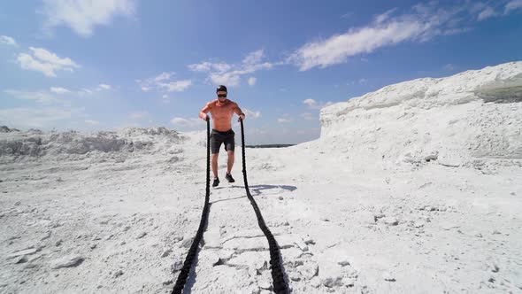 Man working out with fitness rope