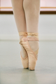 Close up of ballerina legs in ballet pointe shoes. - PhotoDune Item for Sale