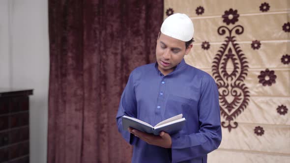 Muslim man reading a poem