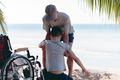 Outdoor activity with travel by wheelchair . - PhotoDune Item for Sale