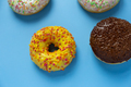 Donuts on blue background - PhotoDune Item for Sale