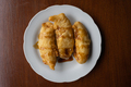 Top down view of pisang goreng (fried banana) on a white plate - PhotoDune Item for Sale