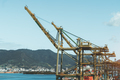 Harbor crane for unloading at port - PhotoDune Item for Sale