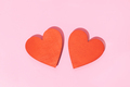 Two Wooden red heart shape isolated on pink background - PhotoDune Item for Sale