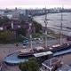 View From a Drone on a Monument Ship Near a Large River in a Metropolis - VideoHive Item for Sale
