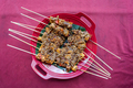 Top down view of vegetarian sate with tofu and tempeh covered in a peanut sauce - PhotoDune Item for Sale