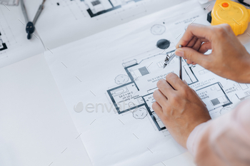 vising the house designs of a large housing project, he draws roundabouts on the house plans. Home and interior design ideas by architect engineers.