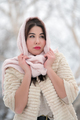 Charming brunette young woman dressed in white three-quarter sleeve fur coat and pink scarf on head - PhotoDune Item for Sale