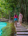 Couple visit the Emerald pool and Blue pool in Krabi Thailand, mangroves, crystal clear water - PhotoDune Item for Sale