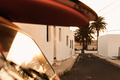 A stack of surfboards on a retro car roof with sun shining. Summer and surf background wallpaper. - PhotoDune Item for Sale