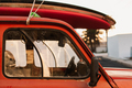 A stack of surfboards on a retro car roof with sun shining. Summer and surf background wallpaper. - PhotoDune Item for Sale
