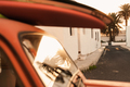 A stack of surfboards on a retro car roof with sun shining. Summer and surf background wallpaper. - PhotoDune Item for Sale