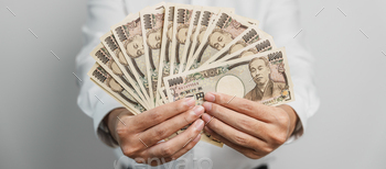 sand Yen money. Japan cash, Tax, Recession Economy, Inflation, Investment, finance and shopping payment concepts