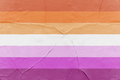Lesbian flag painted on cracked textured wall - PhotoDune Item for Sale