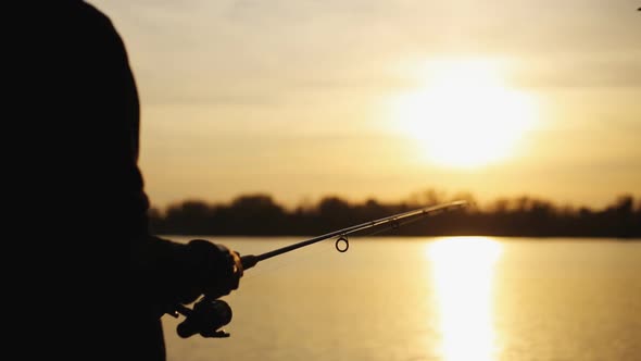 Fisherman Сatches A Fish